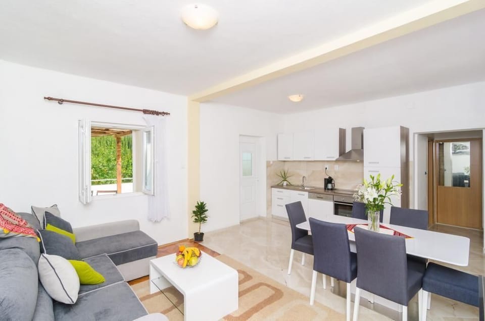 Villa (TwoBedroom Villa with Terrace and Swi) | Living room | Flat-screen TV