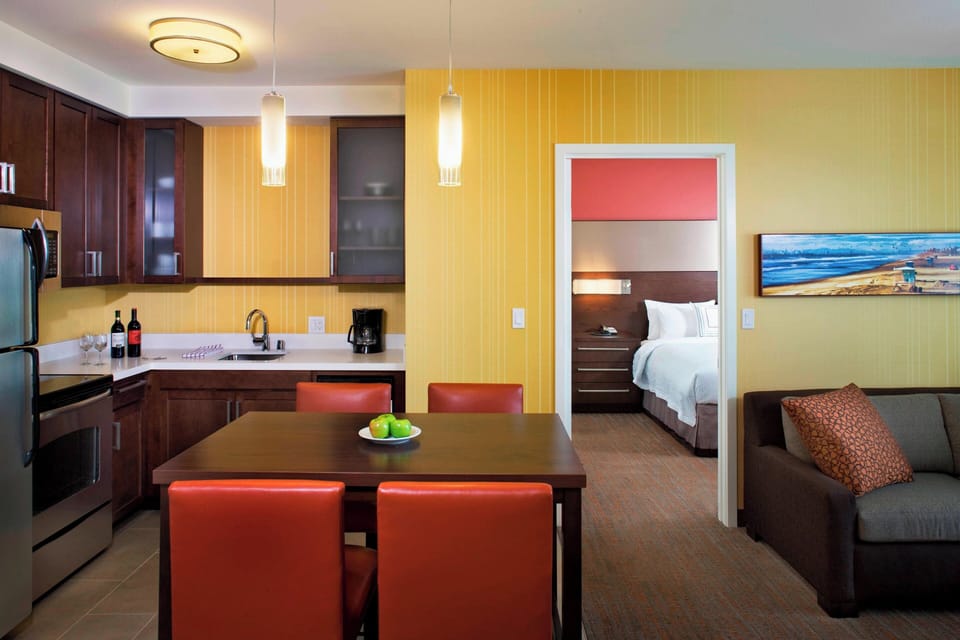 Premium bedding, down comforters, desk, laptop workspace