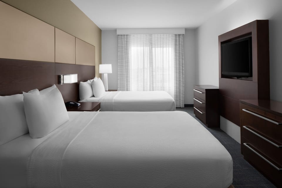 Premium bedding, down comforters, desk, laptop workspace