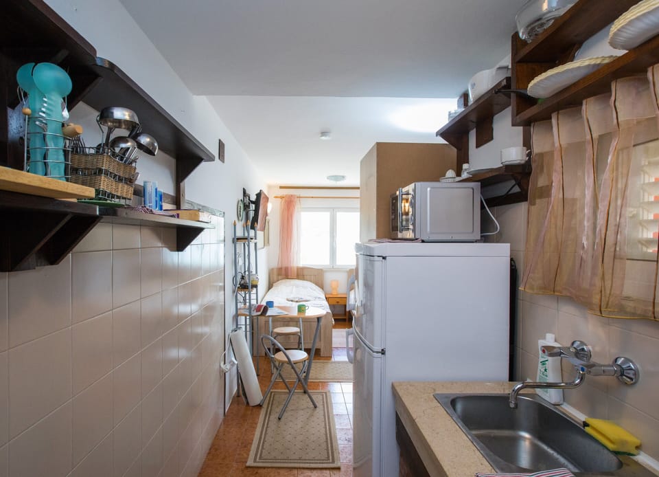 Studio (Studio Apartment with Private Beach a) | Private kitchenette | Fridge