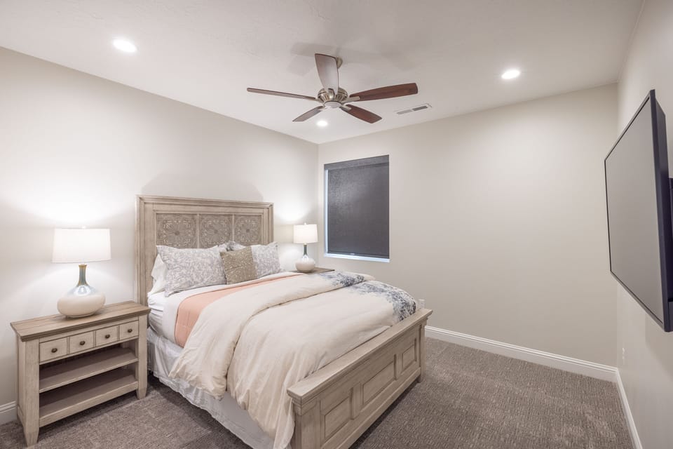 Bedroom 4 - Bedroom 4 includes a Queen bed, private TV, and walk-in closet.
