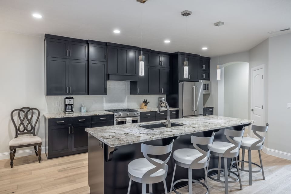 Kitchen Island - The Kitchen Island comfortably seats 4 adults and creates a great space for serving and preparing meals.