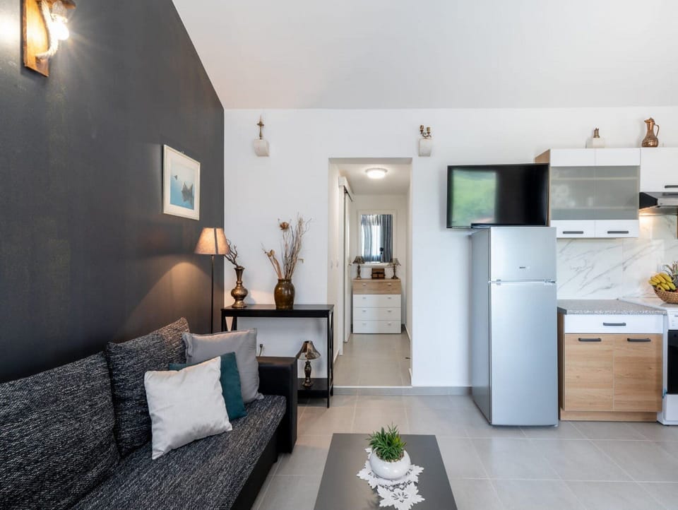 House (Two Bedroom Holiday Home with Swimmin) | Living room | 25-inch flat-screen TV with satellite channels, TV