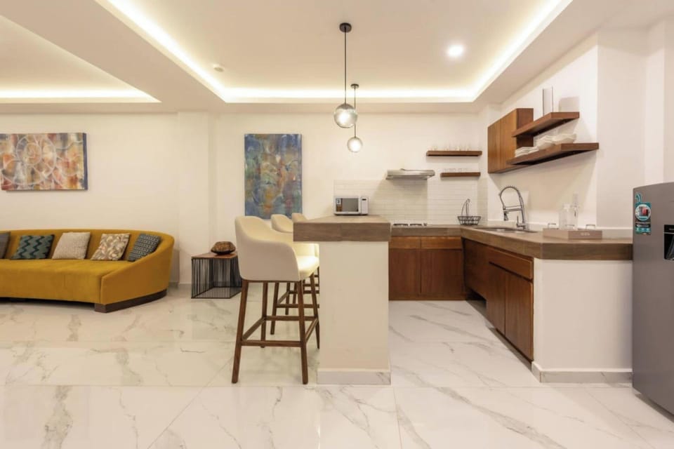 Exclusive Studio Suite, Multiple Beds | Private kitchenette