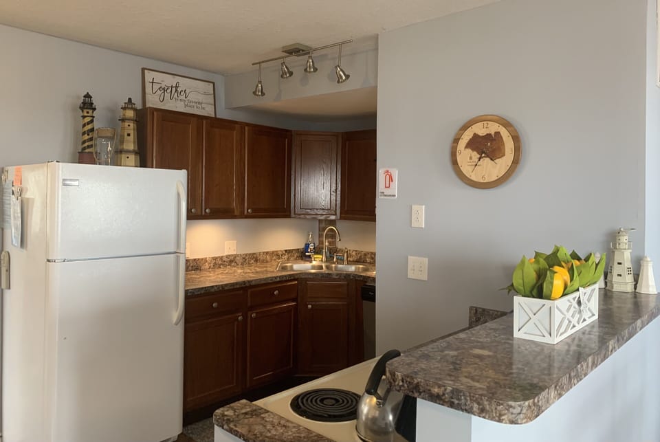 Fully stocked kitchen, 2 full size refrigerators, blender, crockpot, spices, etc
