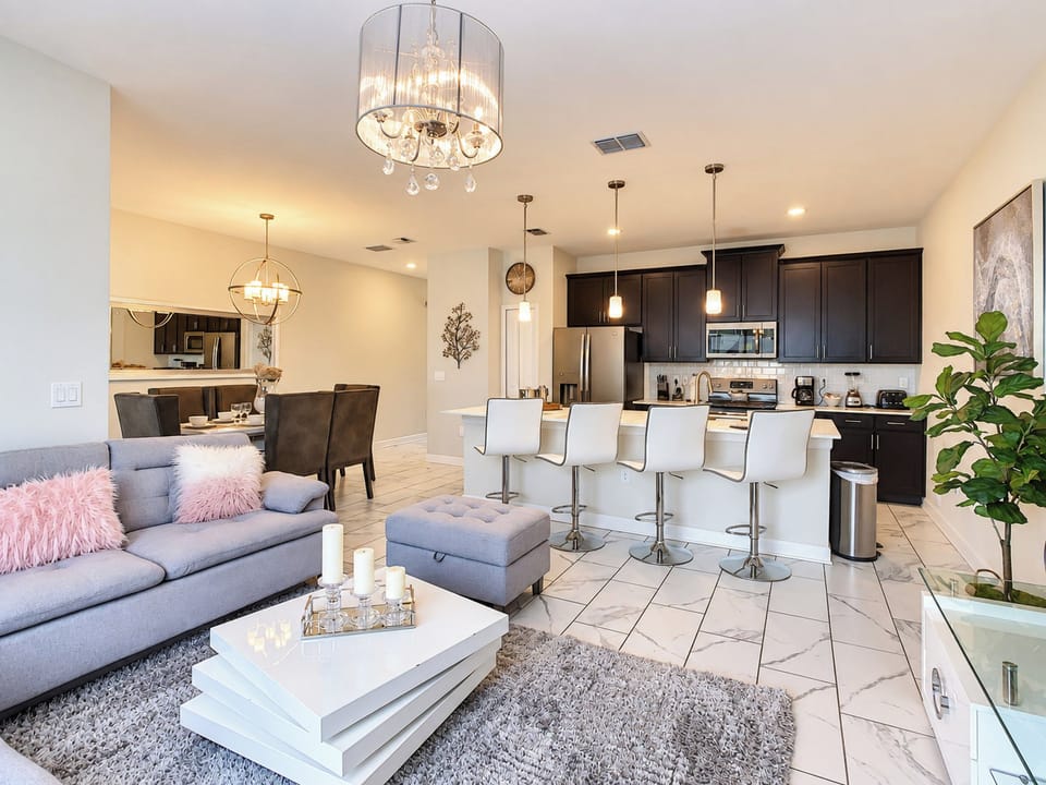 Open-Concept Living Area and Modern Kitchen with Breakfast Bar