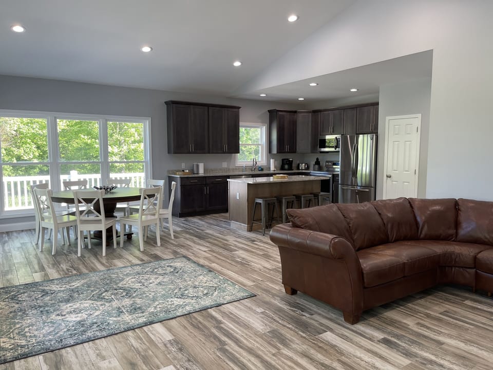 Designer great room, kitchen and dining area built in 2021