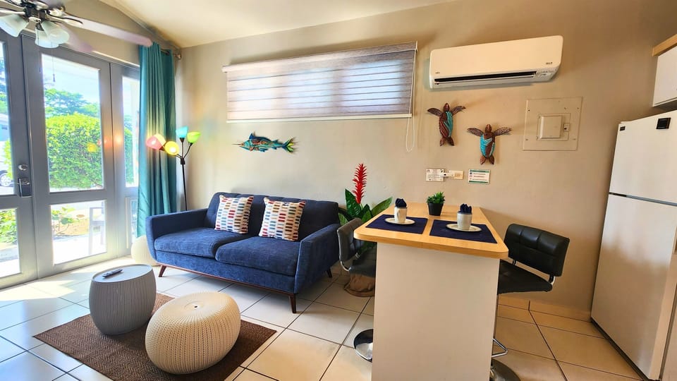 Living Room: Bright and inviting, with colorful decor and a perfect spot for relaxing afternoons!