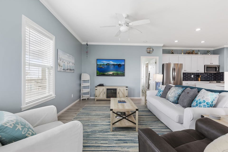 Comfortably furnished in cool coastal palettes