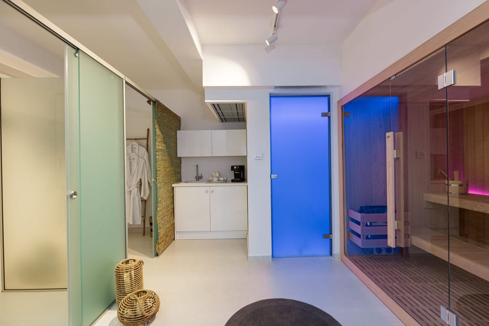 The wooden sauna is located in the spa room