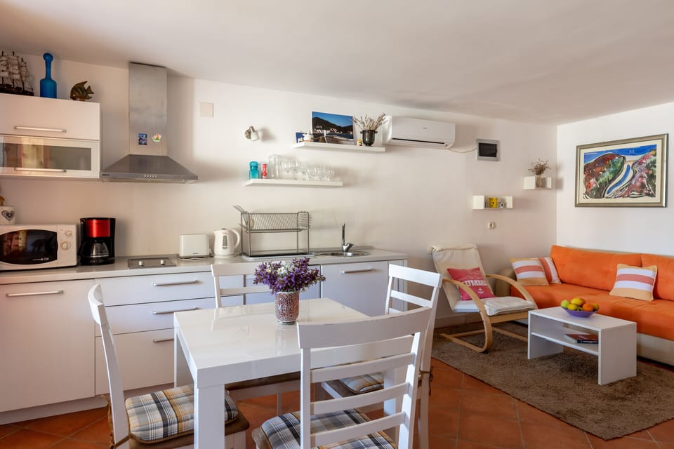 House (Duplex Two Bedroom) | Living room | Flat-screen TV