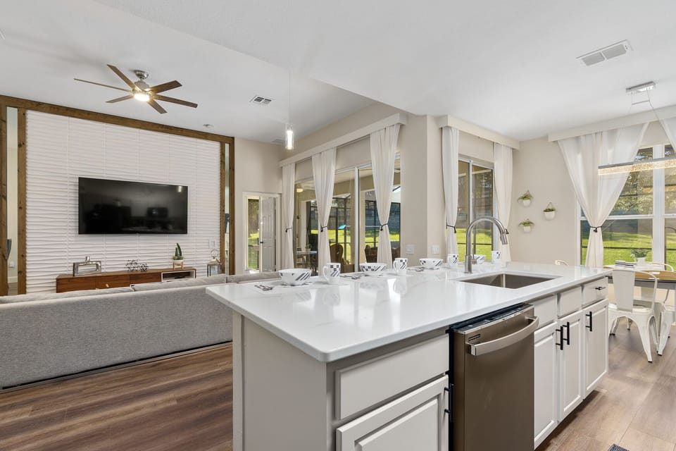 Open concept w/ sliding glass doors to pool
