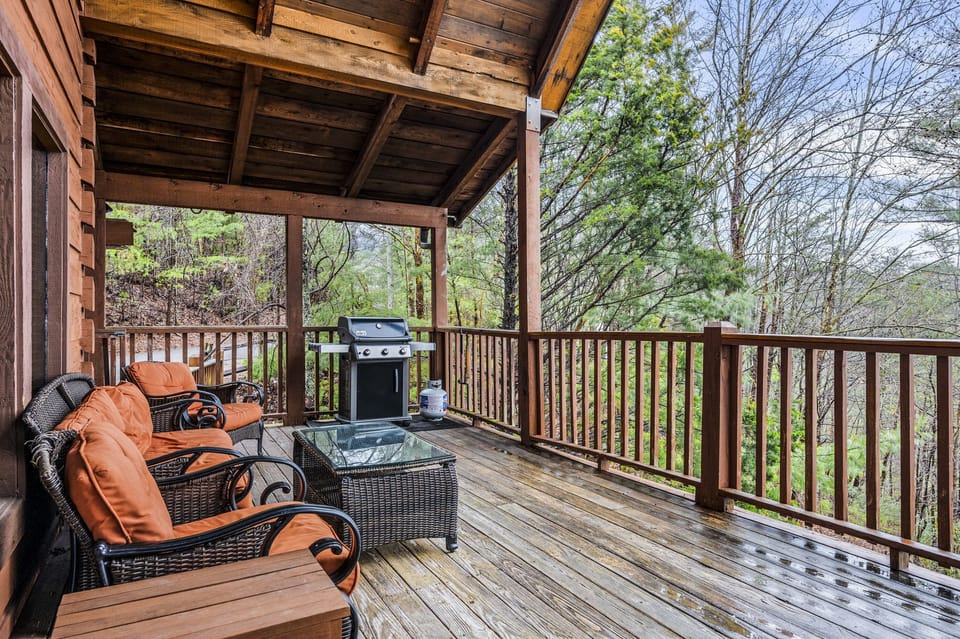 Main level covered deck with grill. Propane is provided. 