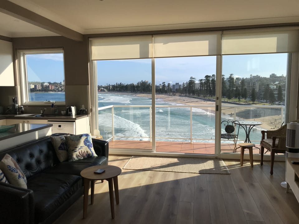 Living area with door to main balcony 
