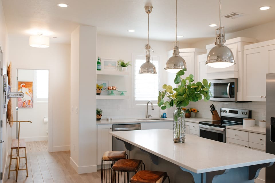 Kitchen area - Spacious open kitchen and dining area, perfect for group meals and gatherings.