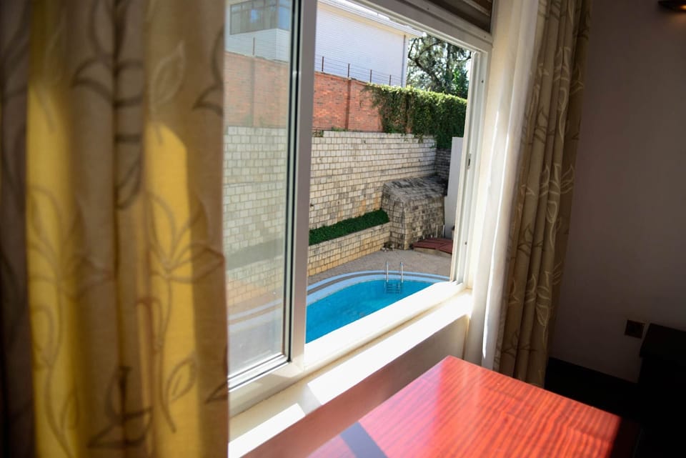 Room, 1 Bedroom, Accessible, Smoking | Pool | Outdoor pool