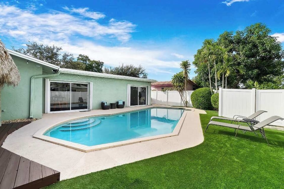spacious backyard with HEATED pool