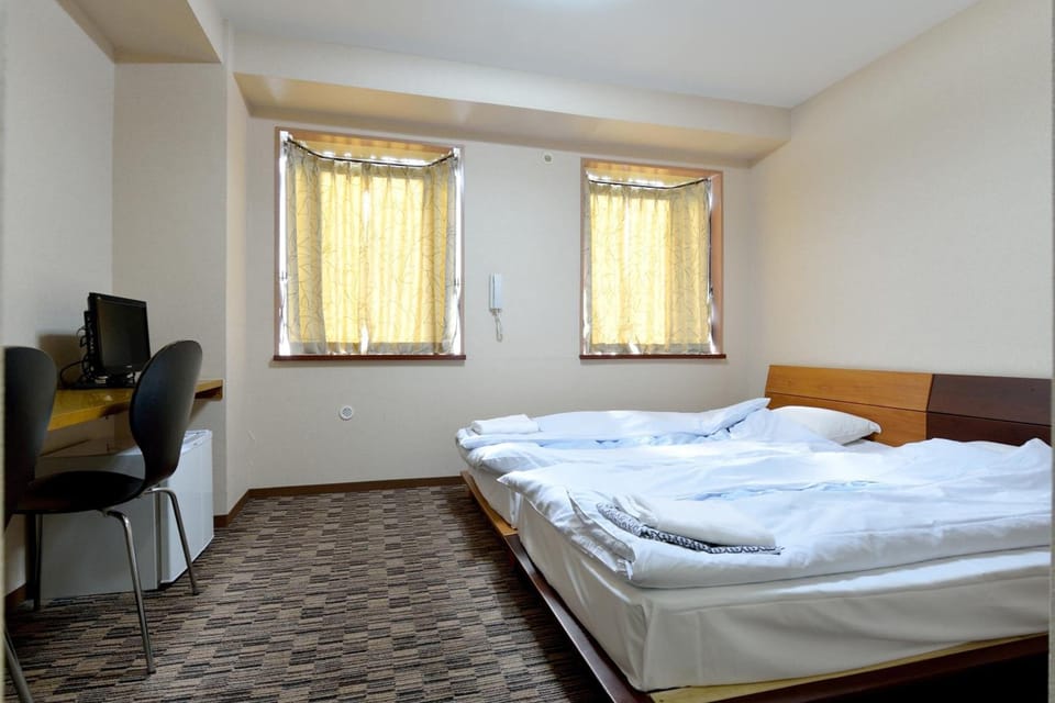 Desk, iron/ironing board, free WiFi, bed sheets