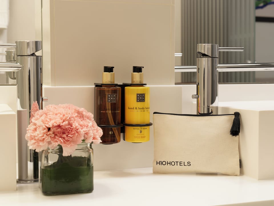 Shower, rainfall showerhead, eco-friendly toiletries, hair dryer