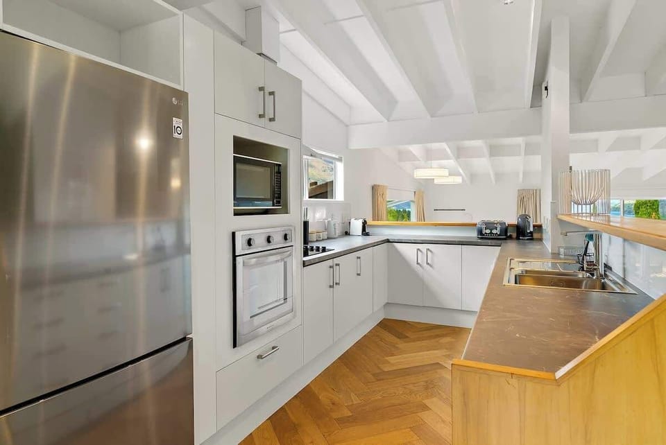 Open plan kitchen overlooking living room 