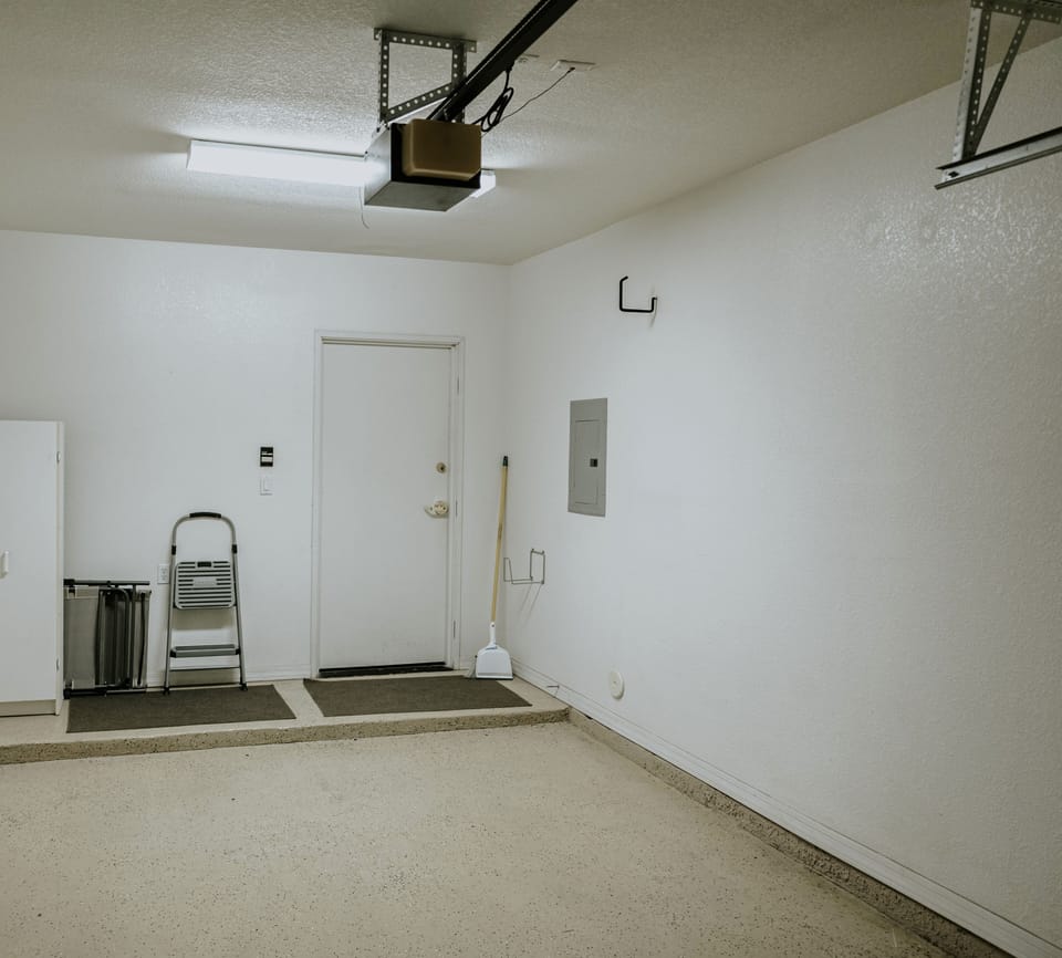 One car garage for parking or you may park in the lot.