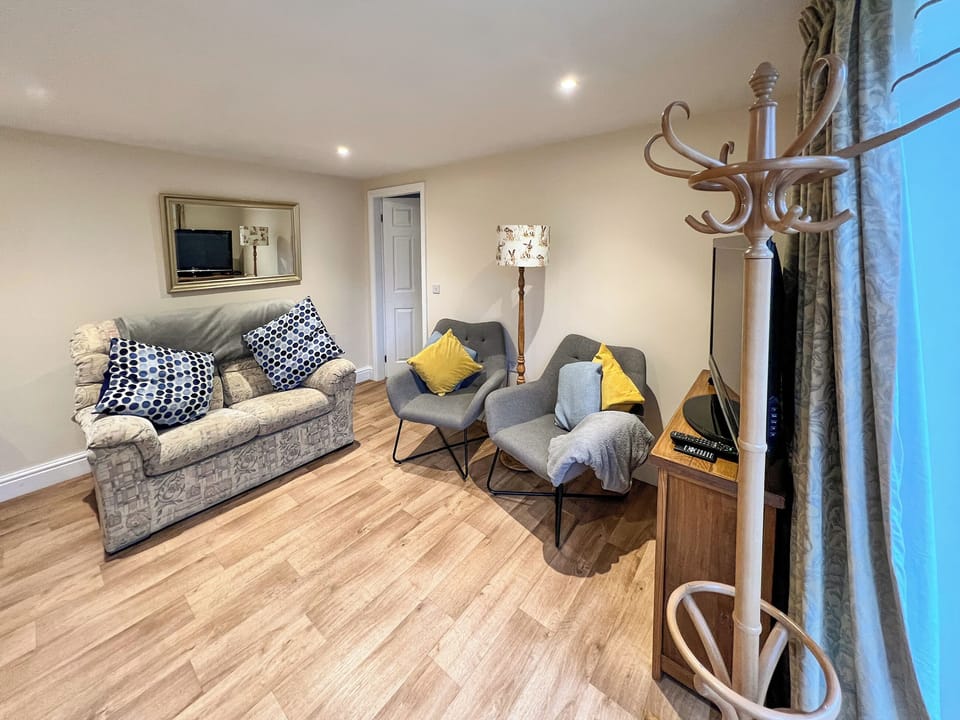 Living room | Delamere House- The Snug, Scagglethorpe, near Malton