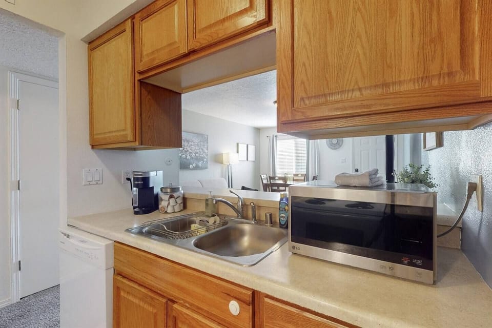 Full kitchen with garbage disposal and dishwasher