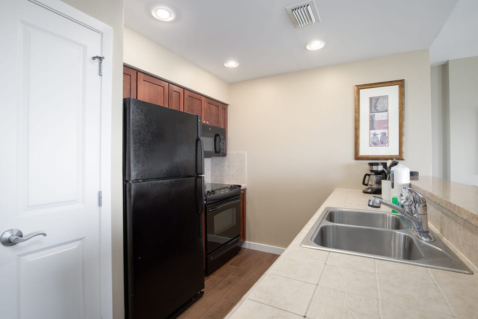 Fully stocked Kitchen - refrigerator, stove/oven, microwave, dishwasher, coffee pot, sink, all dishes and pots/pans that you'd need