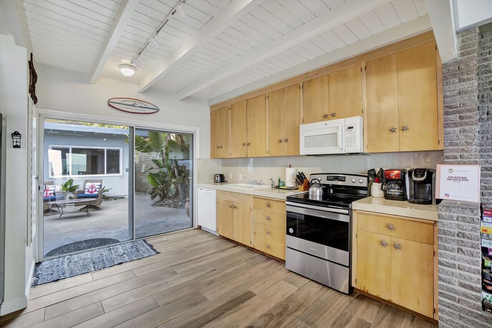 A sleek kitchen with a spacious island
