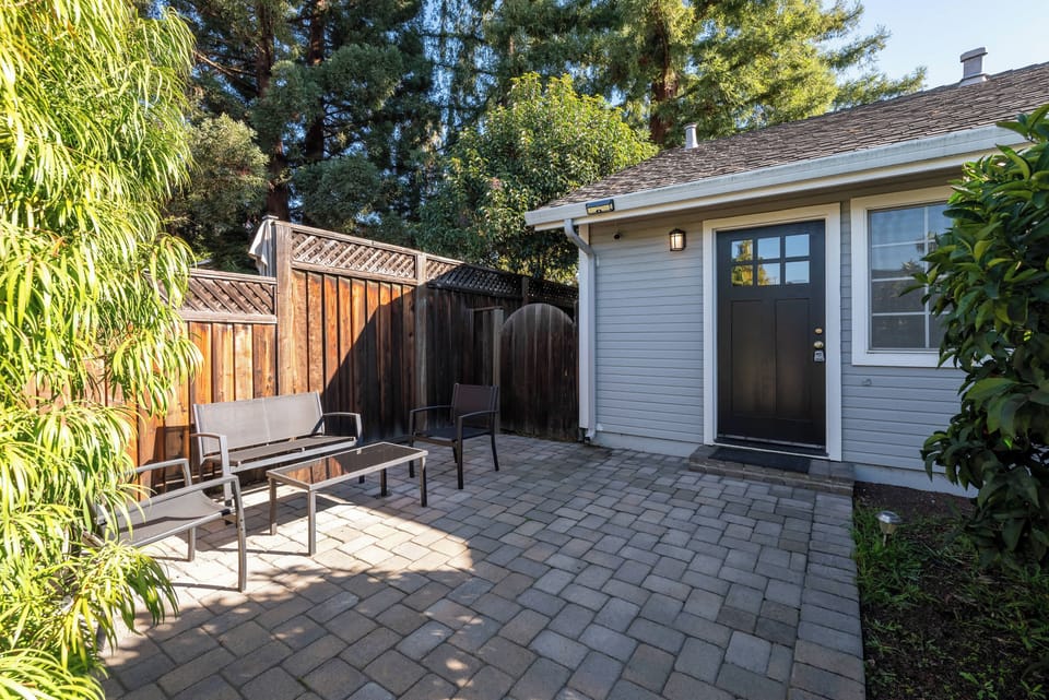 Outside is a patio with furniture, a perfect place to enjoy our bright California sun!
