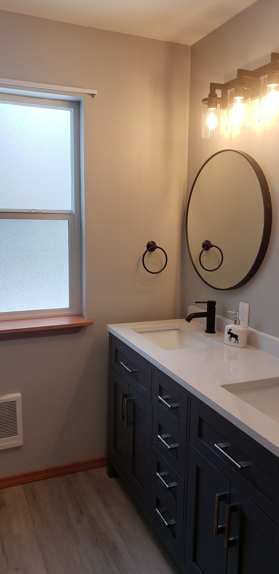 Upper bathroom with double sink. 