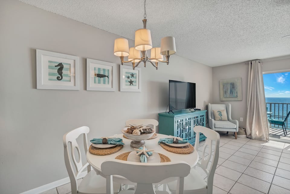 Gather and dine in coastal style. Our bright dining area is beautifully accented with charming seaside decor, providing the perfect setting for meals with a view.