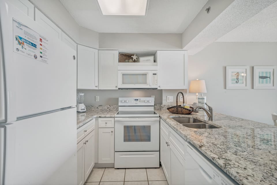 Whip up your favorite meals in our beautifully updated and fully equipped kitchen. Featuring modern appliances, ample counter space, and a breakfast bar, it has everything you need for delightful dining.