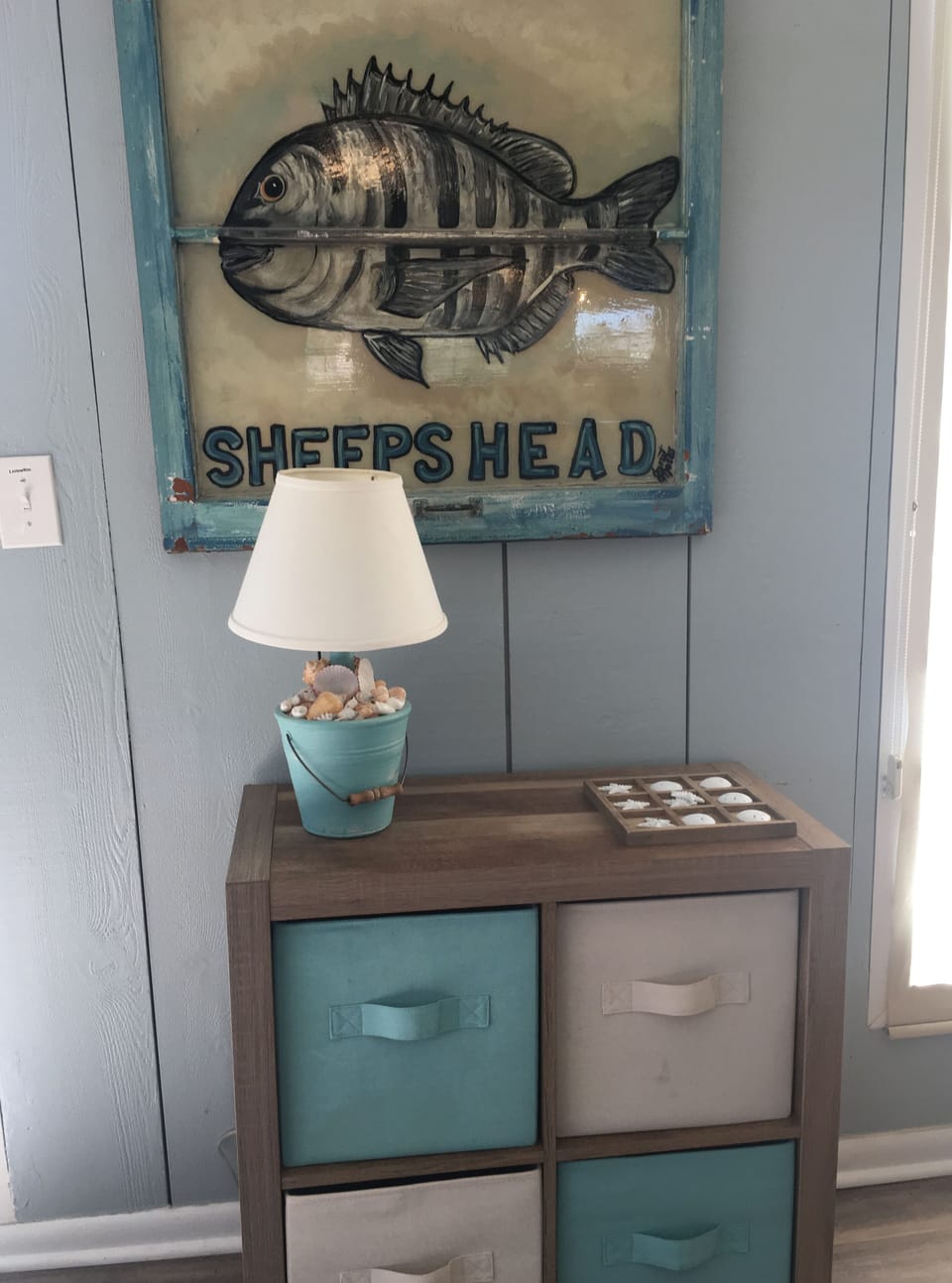 House decor, kid games in top bins.