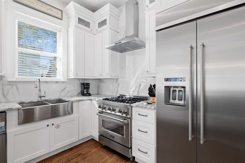 Kitchen - Featuring a Wolf Gas Range