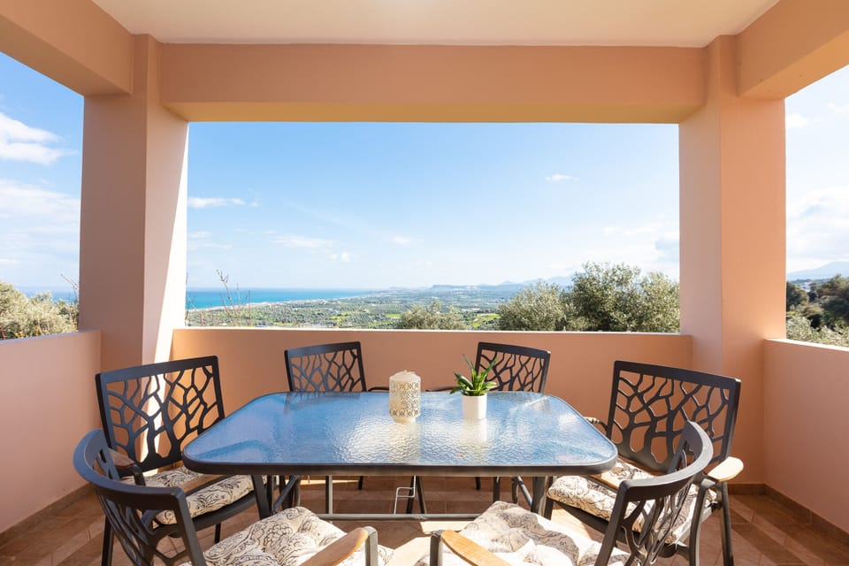 Outdoor dining area in the balcony.
