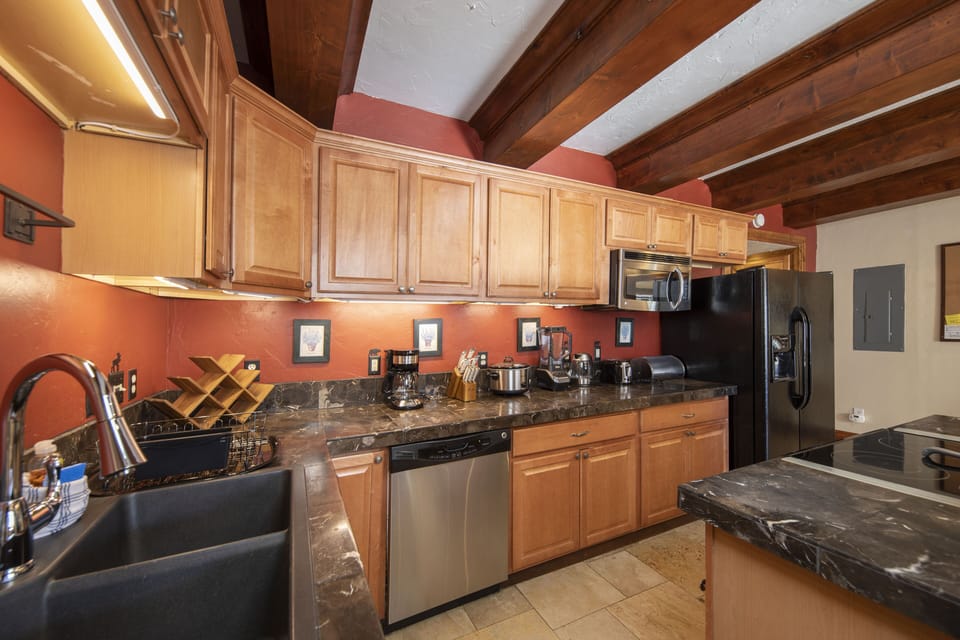 Full kitchen off of the living room.