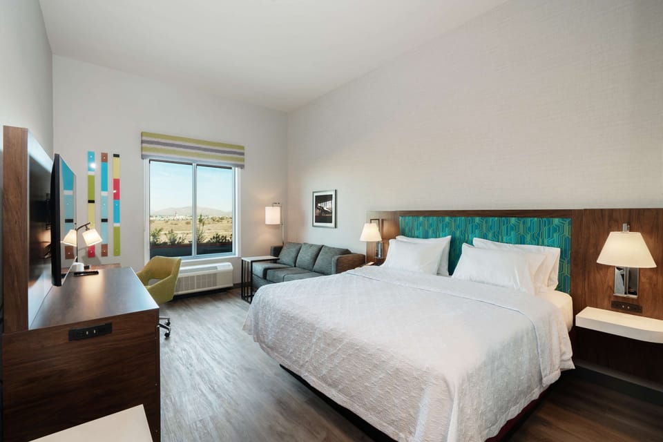 55-inch flat-screen TV with cable channels, TV, pay movies