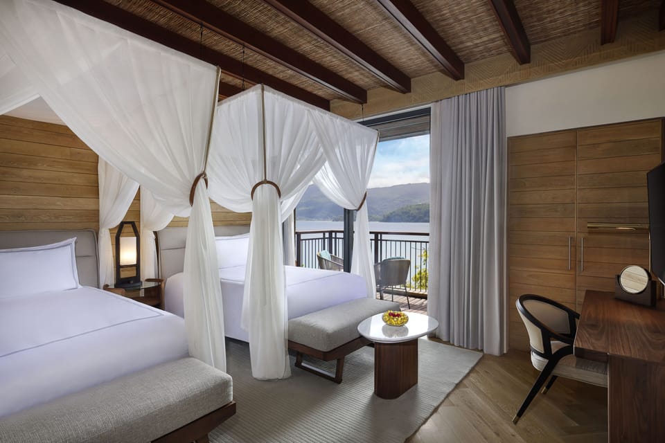 Premium bedding, free minibar items, in-room safe, desk