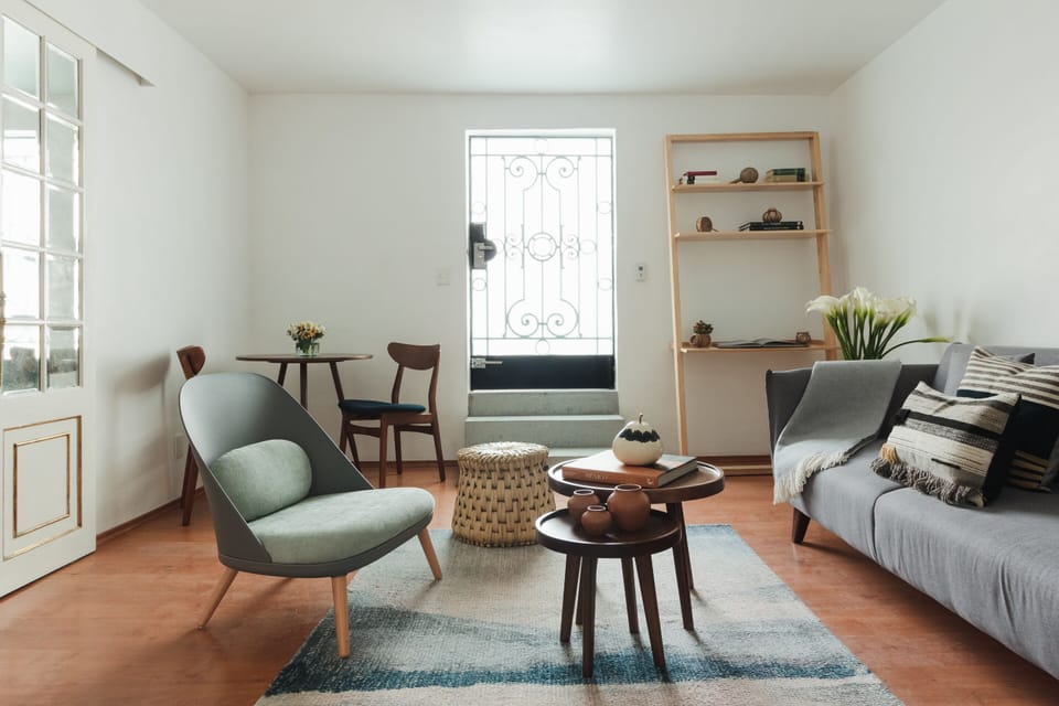 Signature Apartment | Living room | 62-inch Smart TV with cable channels, TV, Netflix