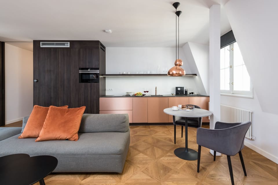 The fully equipped kitchen includes fridge with freezer, cooktop and microwave. 