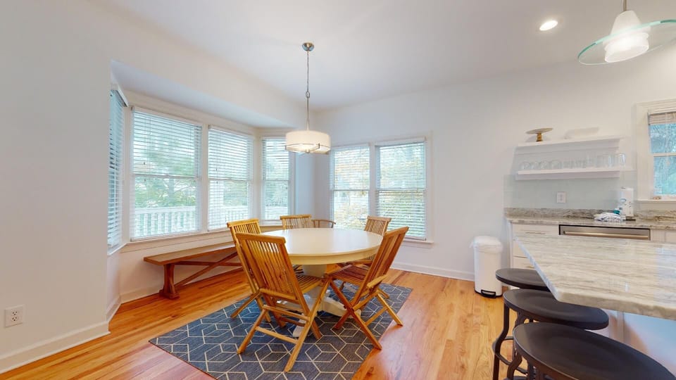 Open dining room to the kitchen with bay windows