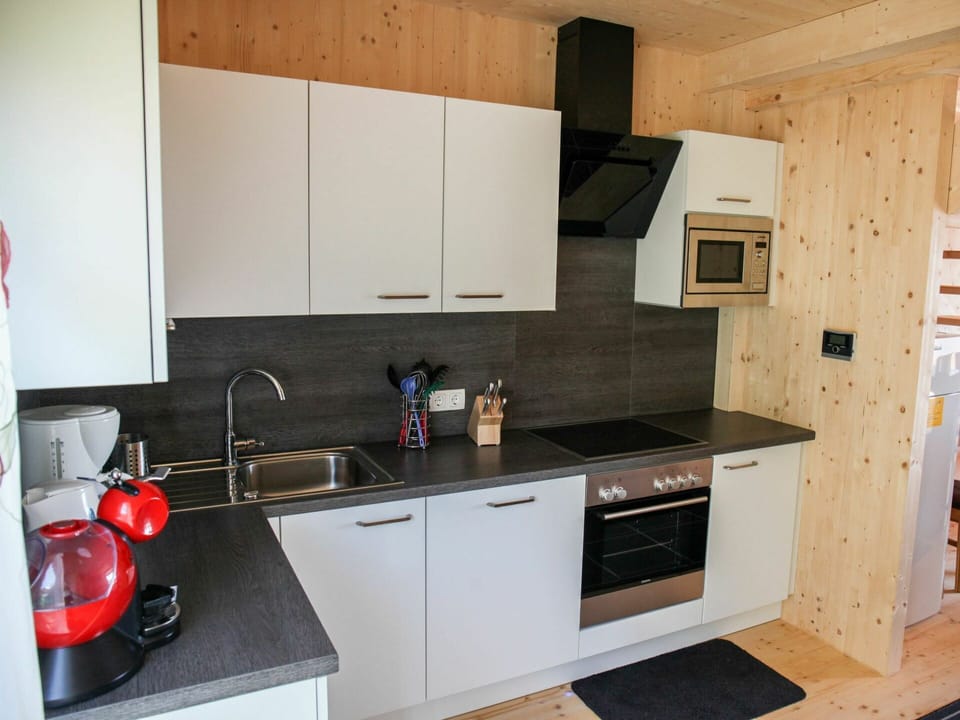 Cabinetry, Kitchen Sink, Property, Countertop, Sink, Tap, Kitchen Appliance, Kitchen Stove, Kitchen, Building