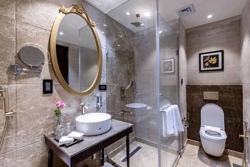 Shower, rainfall showerhead, designer toiletries, hair dryer