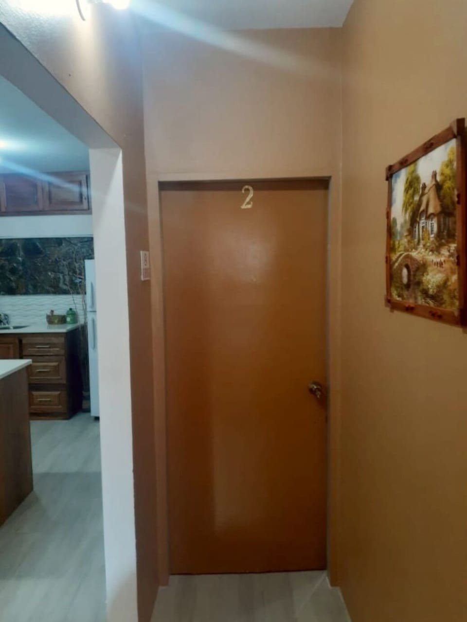 TWO (2) BEDROOM APARTMENT -  DOOR LEADING TO BEDROOM 2