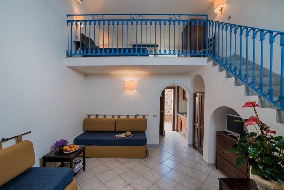 Family Room, Mezzanine | Minibar, in-room safe, free WiFi, bed sheets