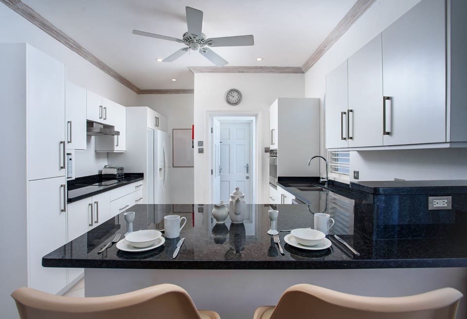 Modern kitchen, equipped with a breakfast bar