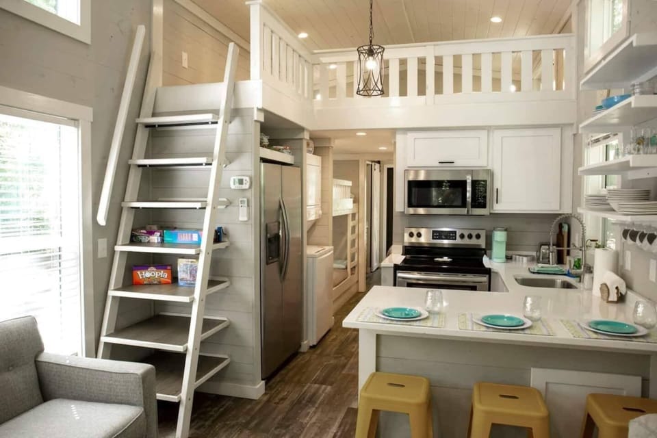 Sleek quartz countertops and top-of-the-line stainless steel appliances, ready to inspire your culinary creations.