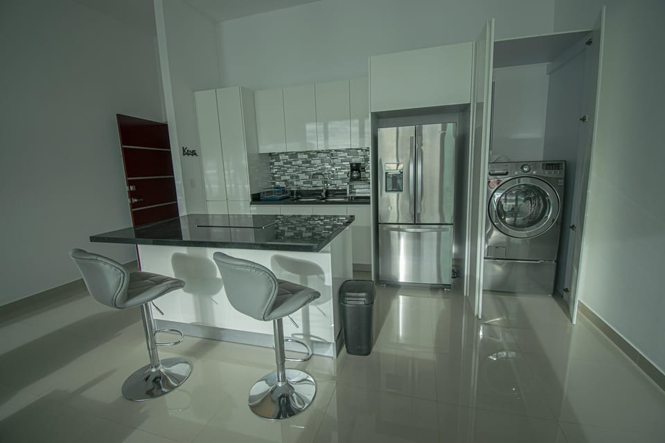 Washer/Dryer next to Kitchen