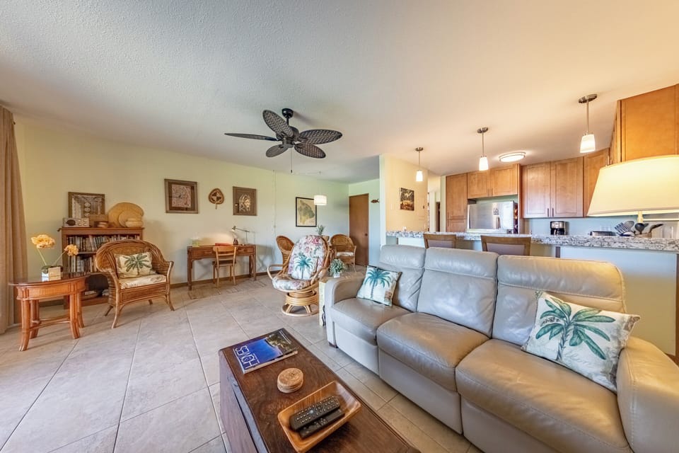 Spacious living area with warm wood furnishings.